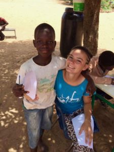 Coline Garcia Sahfa intern in africa sharing time with a boy